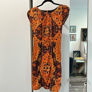 Funky reconstructed 70s vintage fitted mini dress
